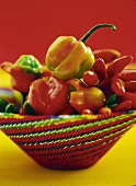 Bowl of mixed chili peppers and sweet peppers