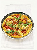 Pizza with seafood and rocket