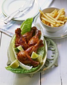 Barbecued chicken legs with honey and ketchup marinade