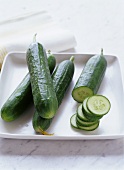 Cucumbers, whole and sliced