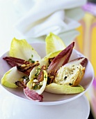 Chicory salad with bacon and bread