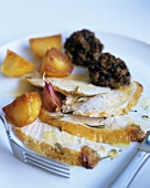 Carved guinea-fowl with olive stuffing