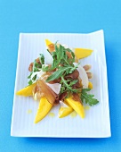 Mango with Parma ham and rocket