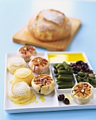Appetiser platter with fresh bread