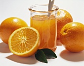 Still life with oranges and orange marmalade