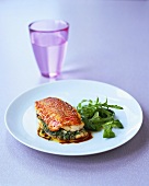 Red mullet with herb stuffing and a glass of water