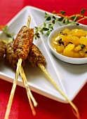 Venison rissoles on skewers with pineapple chutney