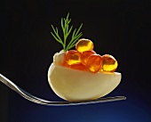 Boiled quail’s egg with salmon caviare
