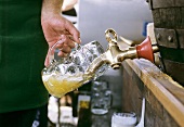 Filling a tankard with draught beer