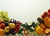 Various types of fruit & vegetables around edge of picture