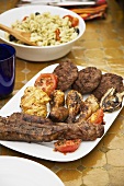 Plate of barbecued meat and poultry