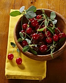 Sour cherries in a wooden bowl