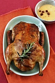 Stuffed duck cooked in roasting sleeve