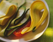 Steamed courgette slices on pepper