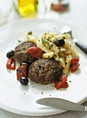 Lamb meatballs with penne and goat's cheese