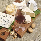 Still life with cheese and red wine