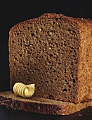 Black bread with butter curl