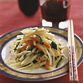 Strips of bamboo with carrots and chives (China)