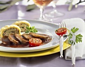 Beef tongue in Madeira sauce with potato roulade
