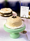 Cake with chocolate buttercream and price label