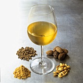 A glass of white wine with aroma components