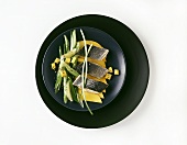 Sea bass with mango and spring onions