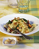 Tagliatelle with spinach and macadamia nuts