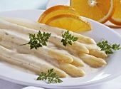 White asparagus with orange sauce