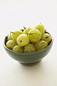 Small bowl of green gooseberries