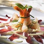 Shrimp tails served with red chicory