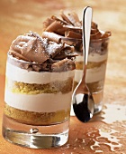 Layered whiskey trifle in glasses
