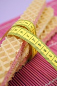 Cream-filled wafers with tape measure