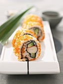 California rolls with caviare on a platter