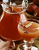 Fruit punch with cloves and cinnamon sticks