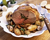 Roast lamb with potatoes and garlic