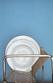 White plates in dish dryer