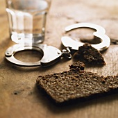 Bread and water with handcuffs