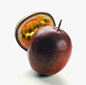 A passion fruit and a single slice