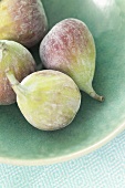 Four figs in a bowl