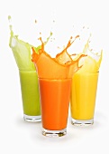Three fruit juices, splashing