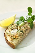 Bread with smoked fish and cucumber paste