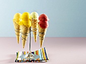 Mango, raspberry, apricot and peppermint ice creams in cones