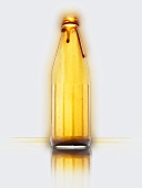 An empty caramel sauce bottle
