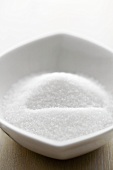 Sugar in a small white bowl