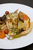 Fried sea bass fillet with vegetables