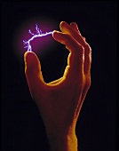 Lightning between two fingers