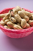 Several peanuts in a basket
