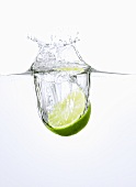 Lime falling into water