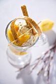 Mascarpone with peaches and sesame strips
