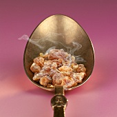 Incense on spoon